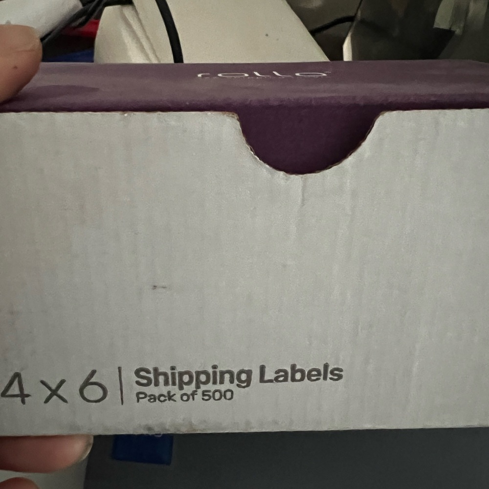 Rollo label printer with box of labels included.  Labels are not a complete box